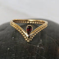 Baizaar - Brass Spotted Chevron Ring with Garnet Stone